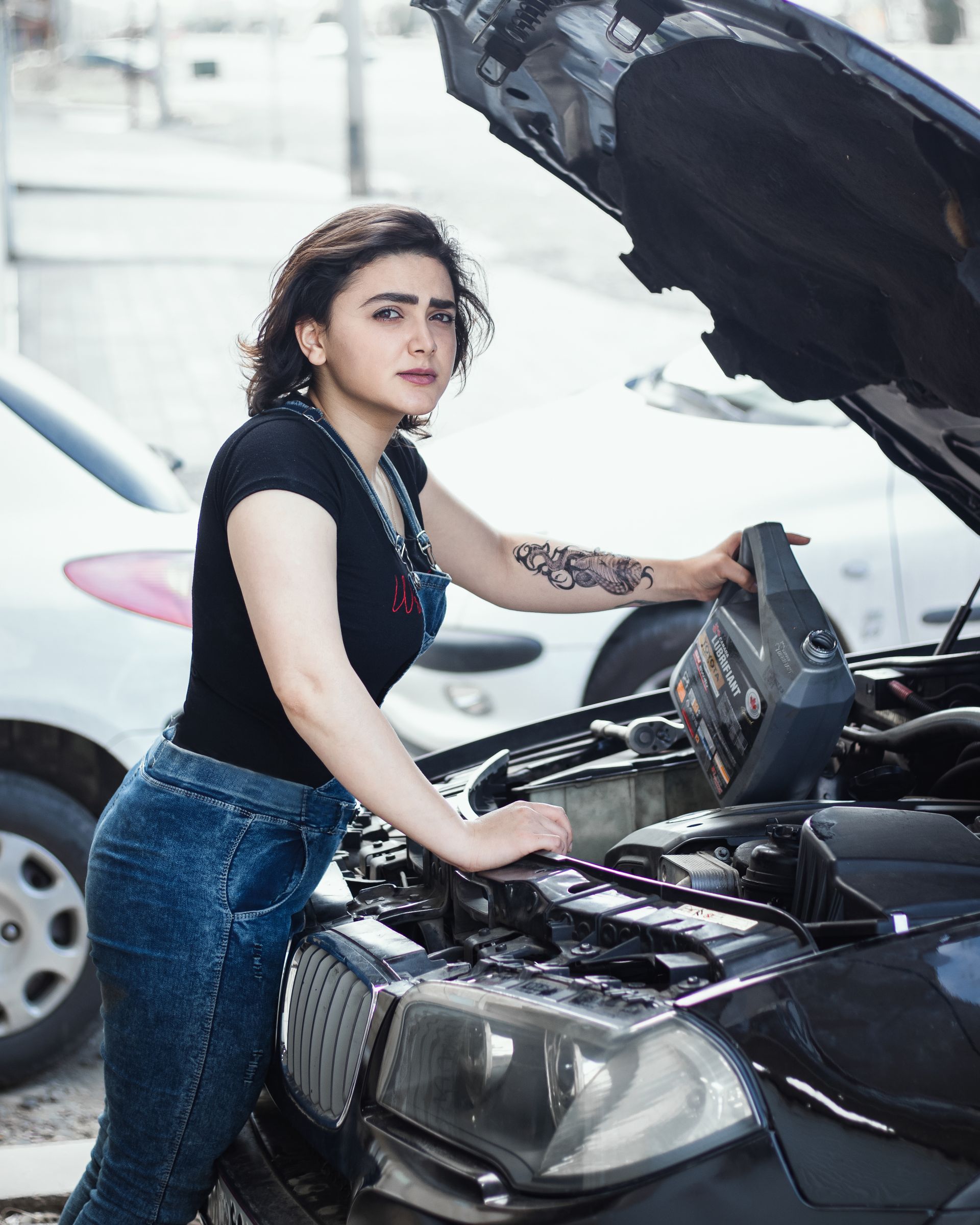 State-certified inspector performing Texas vehicle inspection